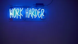 A neon blue sign reading, 